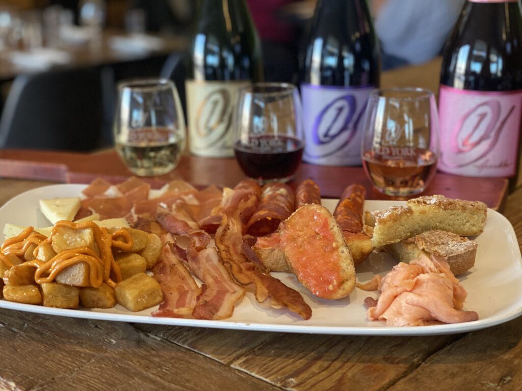 Chef‑crafted brunch plate served during Weekend Bubbly Brunch at Old York Cellars in central NJ, with eggs, potatoes, and fresh garnishes paired with sparkling wine.