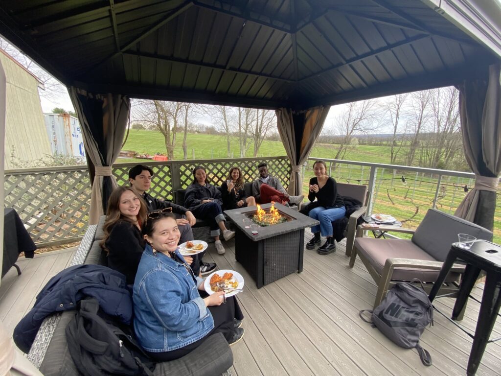 Guests dining under a private cabana at Old York Cellars in Ringoes, NJ, enjoying wine and food pairings in a relaxed outdoor setting.