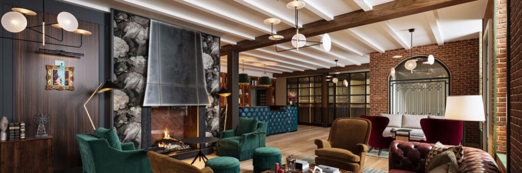 Union Holtel by Marriot Bonvoy, hotel lobby featuring velvet armchairs, leather sofas, a modern fireplace, and exposed brick walls with warm ambient lighting in Flemington, NJ.